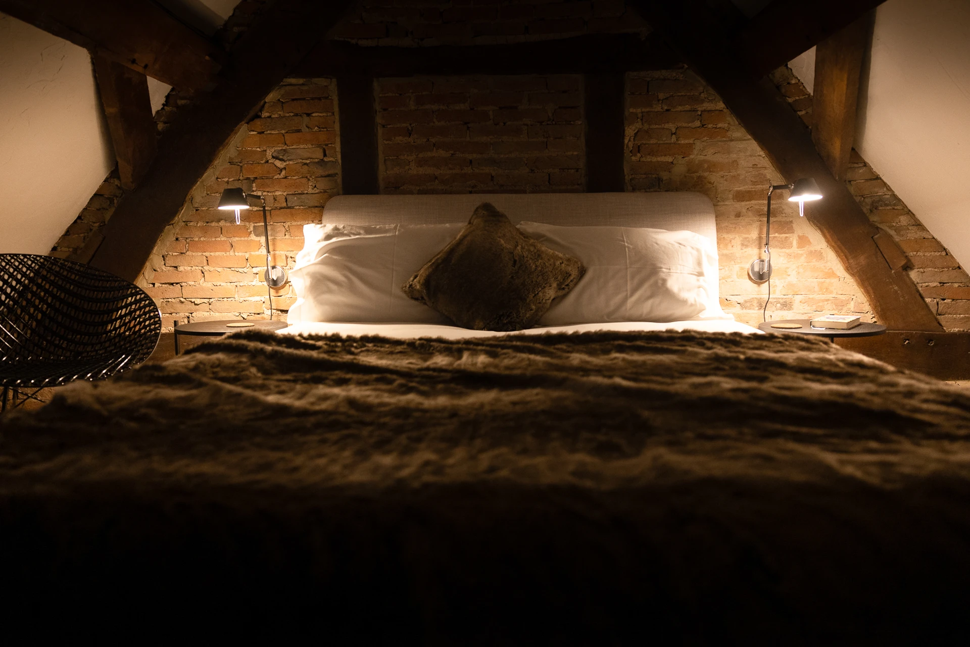 Bedroom beneath the original beams at 42 Church Street