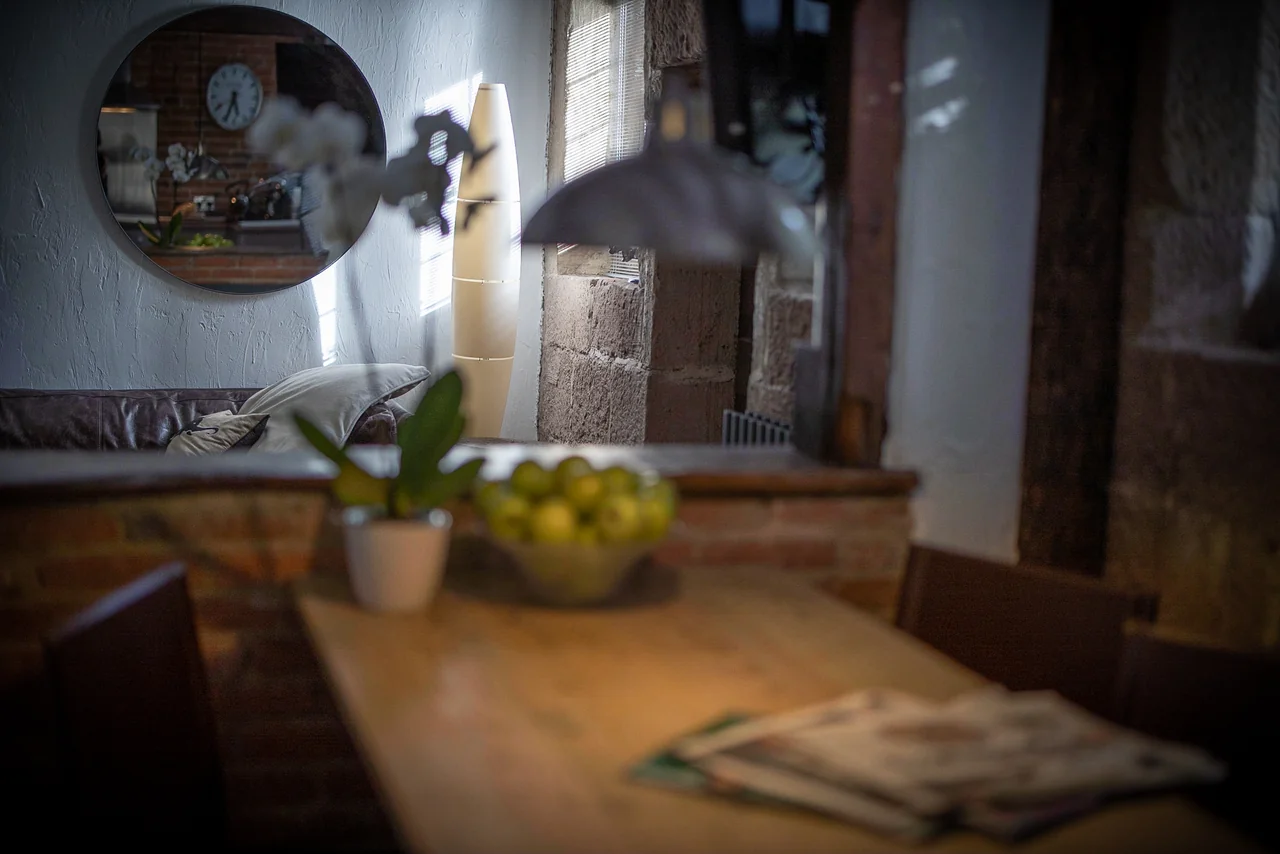 Dining room and round mirror at 46 Church Street