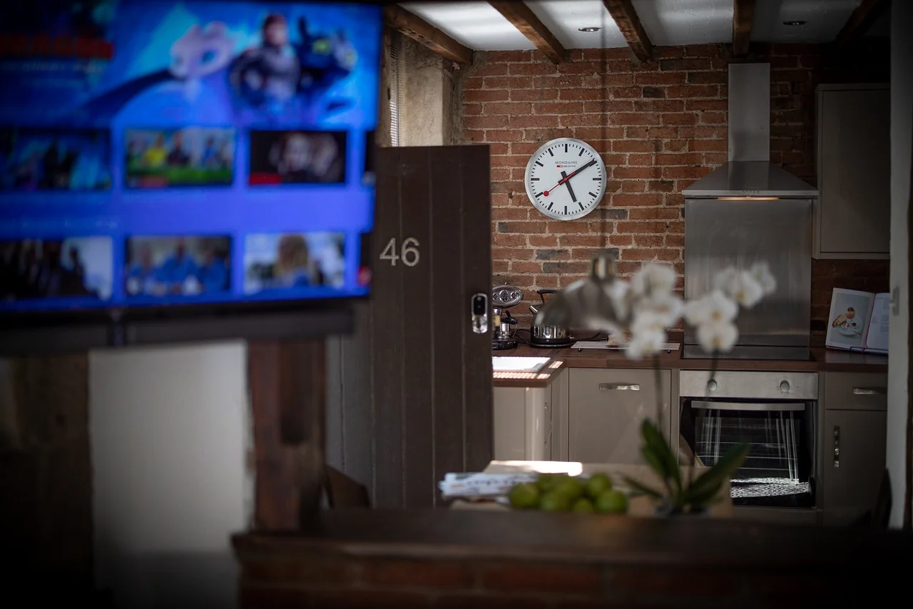 Television and kitchen at 46 Church Street