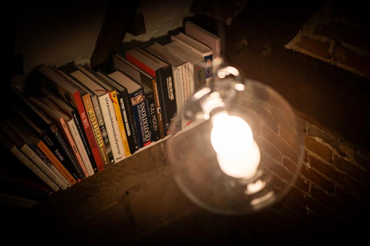 Books and reading light at 46 Church Street