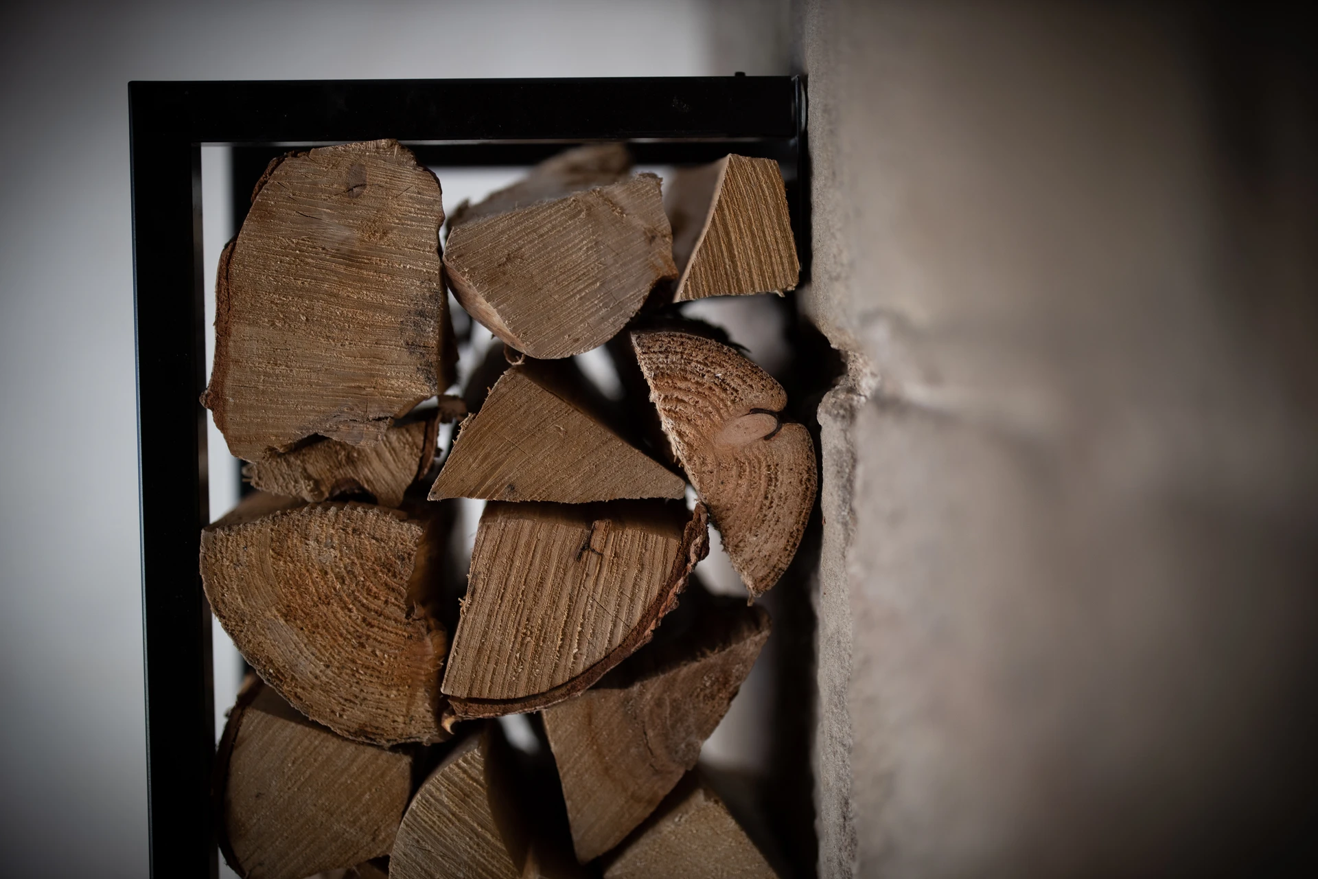 Stacked firewood at 46 Church Street, Ashbourne